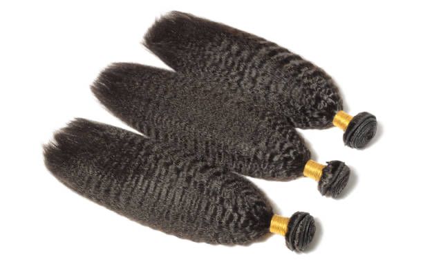 Textura suave y rizada de color marrón oscuro.